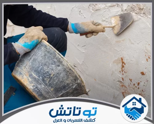 فحص المباني الجاهزة في عجمان 0565603382 شركة توتاتش واجهة مبنى حديث تحت الإنشاء تغطيها السقالات المعدنية لتركيب الحجر والتشطيبات